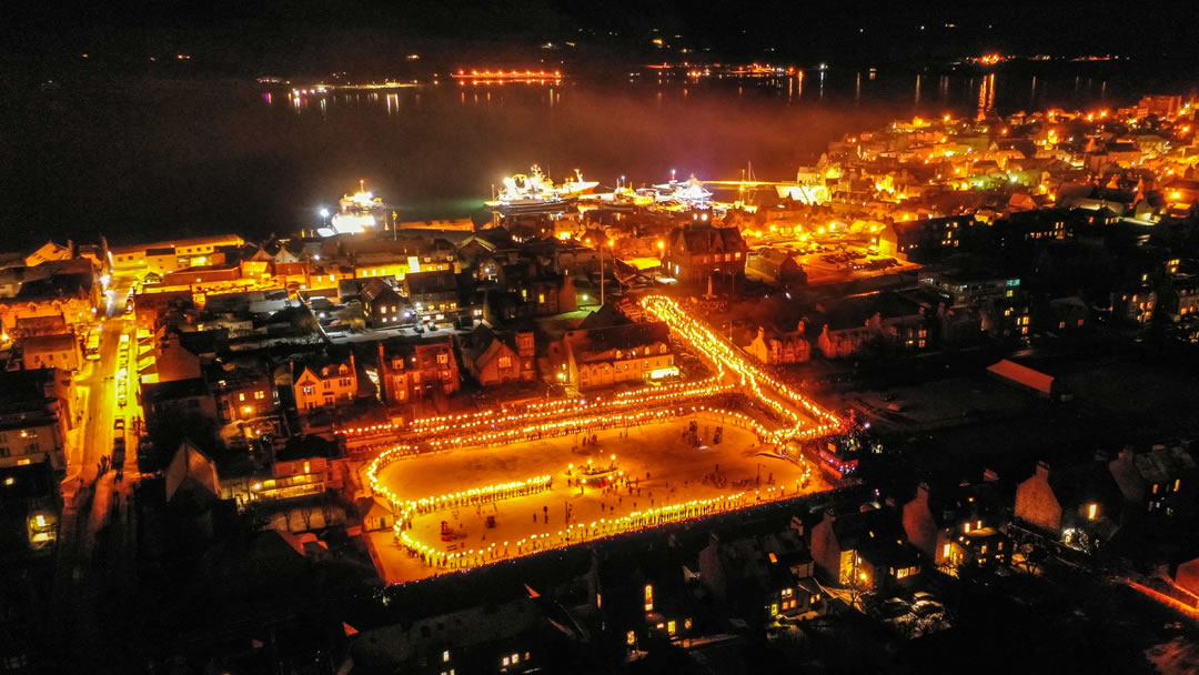 Blazing torches light up the streets at Up Helly Aa in Lerwick, Shetland