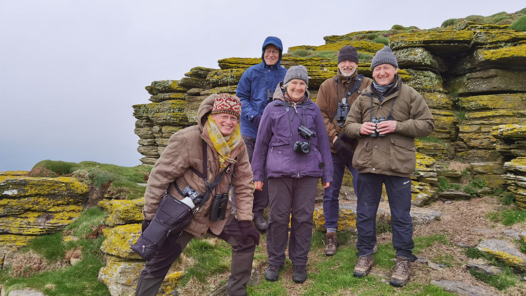 One of Steve's tour groups having fun exploring Orkney