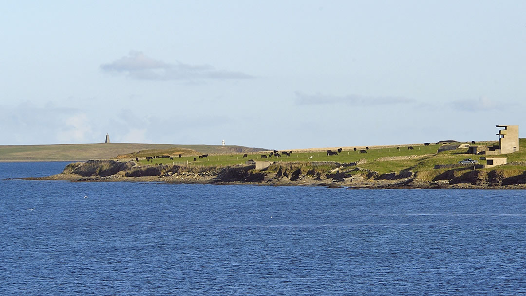 The north shore of Burray, with Northfield coastal defence battery and two ruined Iron Age brochs visible