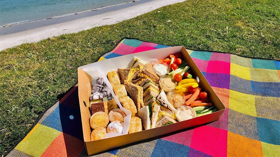 Enjoying a picnic box in the sun