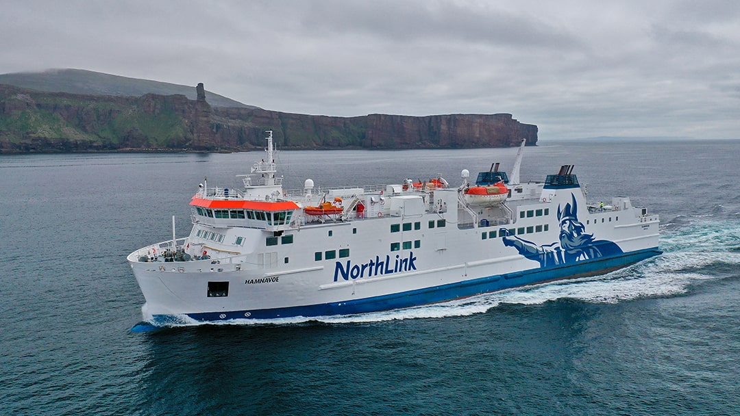 The MV Hamnavoe sailing past the Old Man of Hoy