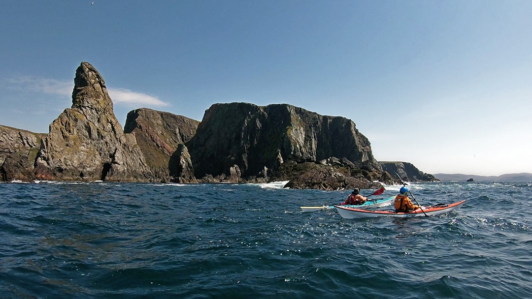 Paddling past the Gordi Stack and Hevda in Shetland