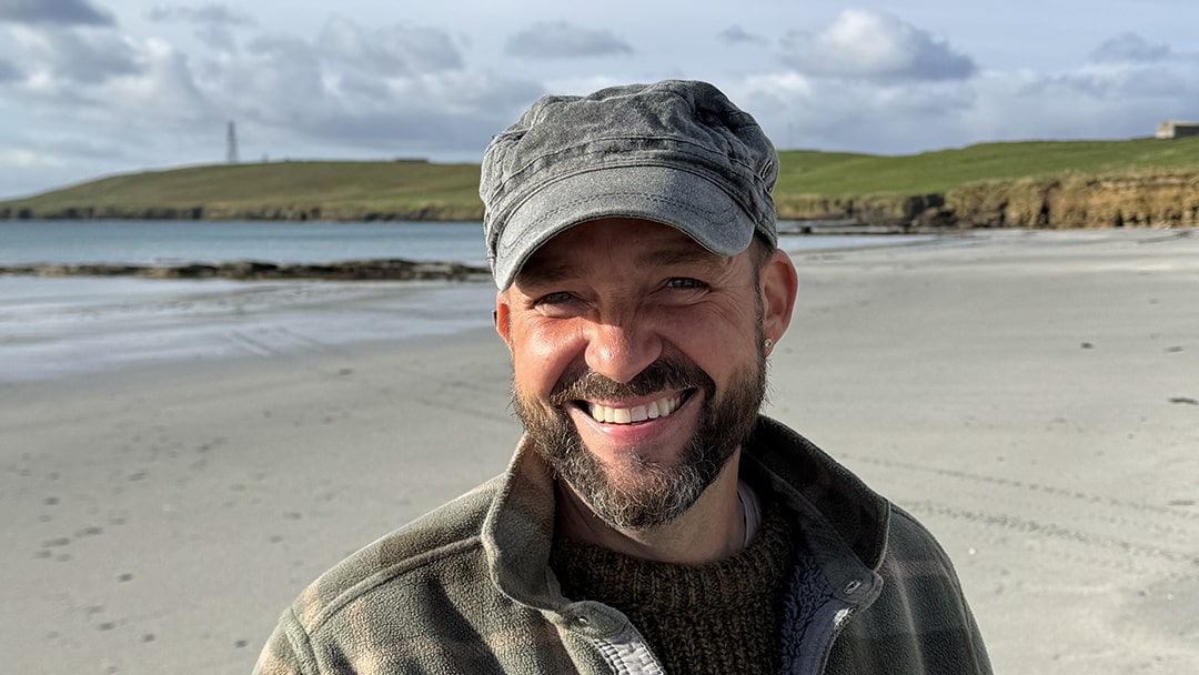 Dave Walker on a beach in Sanday, Orkney