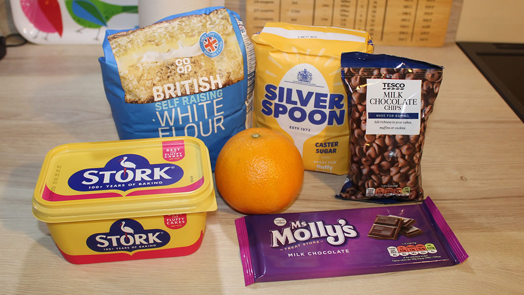 Ingredients needed to make orange biscuits